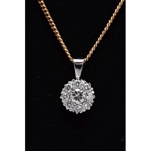 195 - A LATE 20TH CENTURY ROUND DIAMOND CLUSTER PENDANT AND CHAIN, centring on a modern round brilliant cu... 