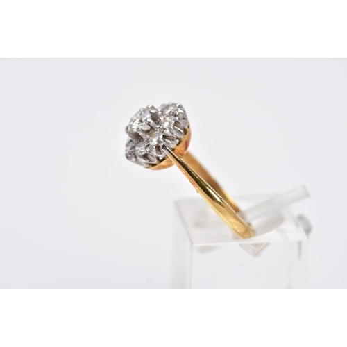 196 - A LATE 20TH CENTURY ROUND DIAMOND CLUSTER RING, centring on a  modern round brilliant cut diamond, e... 