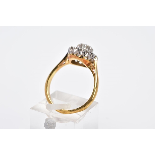 196 - A LATE 20TH CENTURY ROUND DIAMOND CLUSTER RING, centring on a  modern round brilliant cut diamond, e... 