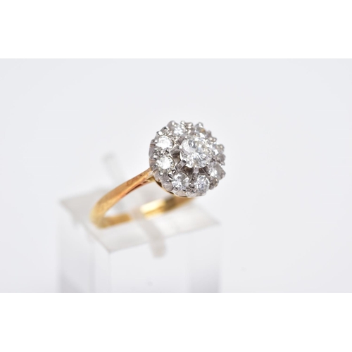 196 - A LATE 20TH CENTURY ROUND DIAMOND CLUSTER RING, centring on a  modern round brilliant cut diamond, e... 