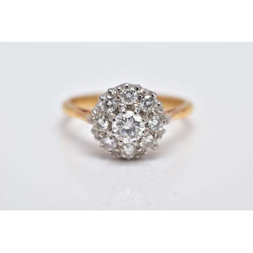 196 - A LATE 20TH CENTURY ROUND DIAMOND CLUSTER RING, centring on a  modern round brilliant cut diamond, e... 