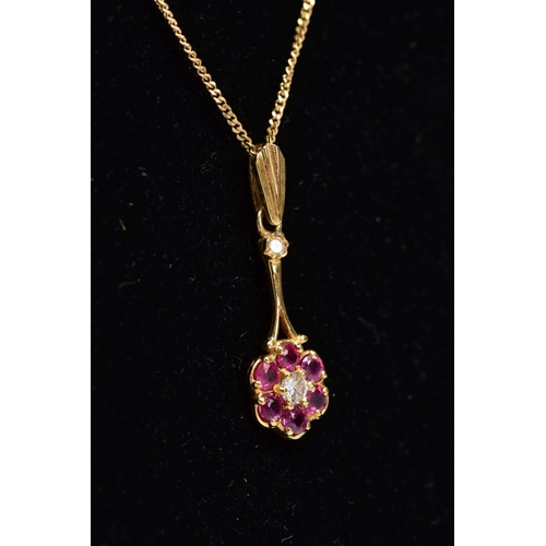 197 - A LATE 20TH CENTRY 18CT GOLD RUBY AND DIAMOND ROUND CLUSTER DROP PENDANT AND CHAIN, pendant measurin... 