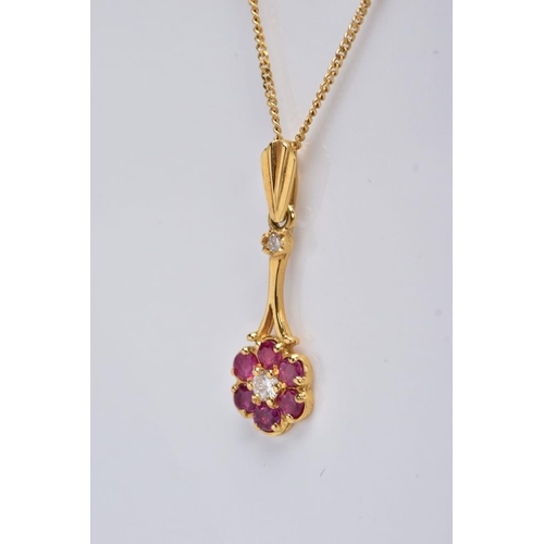 197 - A LATE 20TH CENTRY 18CT GOLD RUBY AND DIAMOND ROUND CLUSTER DROP PENDANT AND CHAIN, pendant measurin... 