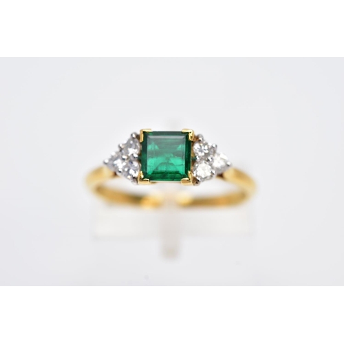 198 - A LATE 20TH CENTURY 18CT GOLD EMERALD AND DIAMOND RING, centring on a square cut emerald measuring a... 