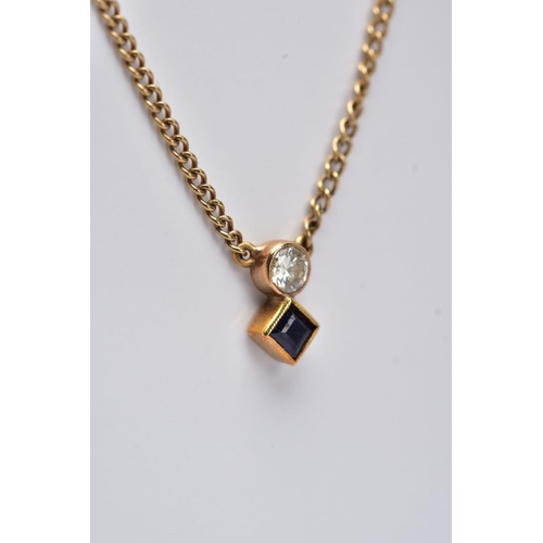 202 - A DIAMOND AND SAPPHIRE TWO STONE NECKLET, a modern round brilliant cut diamond, estimated weight 0.1... 