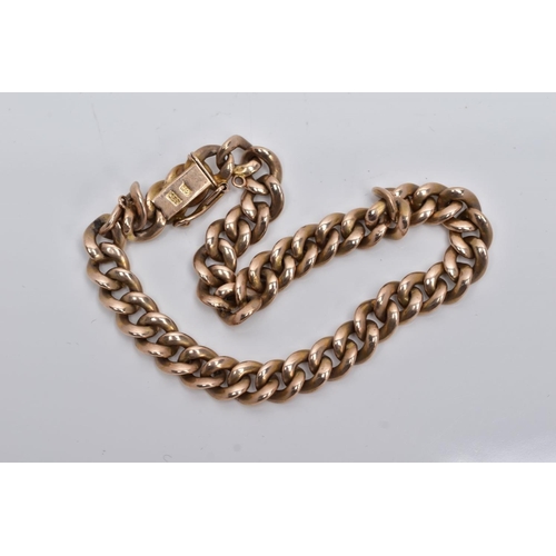 207 - A HOLLOW CURB LINK BRACELET, measuring approximately 210mm in length, fitted to an integral box clas... 