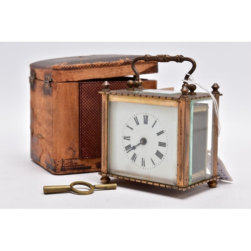 211 - A SMALL LEATHER CASED BRASS TRAVEL CARRIAGE CLOCK, glass panels, white dial with roman numerals, mec... 