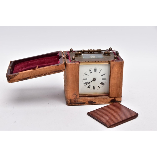 211 - A SMALL LEATHER CASED BRASS TRAVEL CARRIAGE CLOCK, glass panels, white dial with roman numerals, mec... 