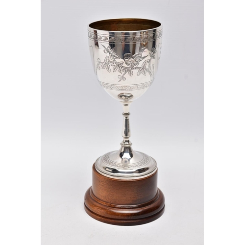 217 - A LATE VICTORIAN SILVER TROPHY CUP, engraved foliate and bird design, engraved inscription 'Presente... 