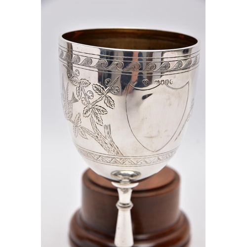 217 - A LATE VICTORIAN SILVER TROPHY CUP, engraved foliate and bird design, engraved inscription 'Presente... 