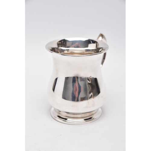 218 - A SILVER TANKARD, bell shaped body with a feather detailed handle, hallmarked 'Roberts & Dore' Birmi... 