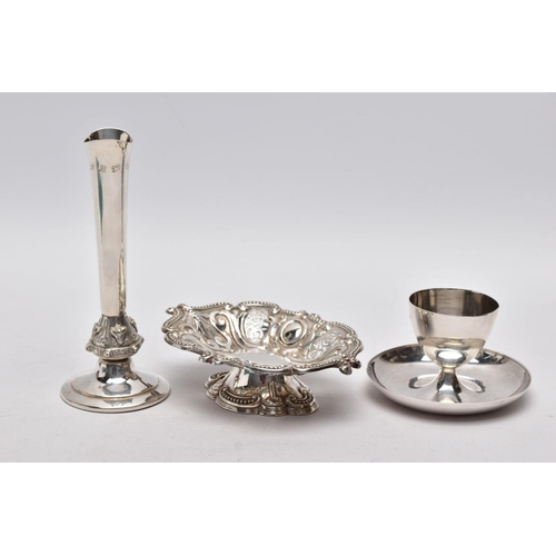 223 - A SILVER EGG CUP, BONBON DISH AND A POSY VASE, the egg cup of a plain polished design fitted on a ci... 