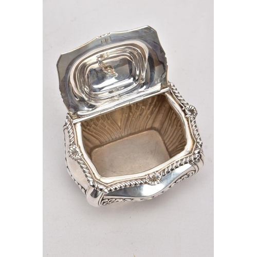 225 - AN EDWARDIAN SILVER TEA CADDY, bomb shaped sucrier with hinged cover, gadrooned and shell cast rim, ... 