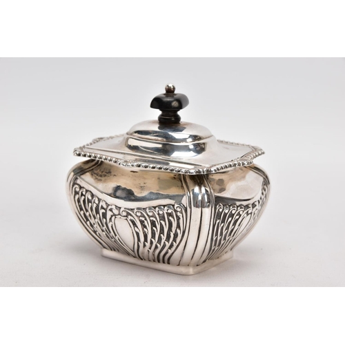 225 - AN EDWARDIAN SILVER TEA CADDY, bomb shaped sucrier with hinged cover, gadrooned and shell cast rim, ... 