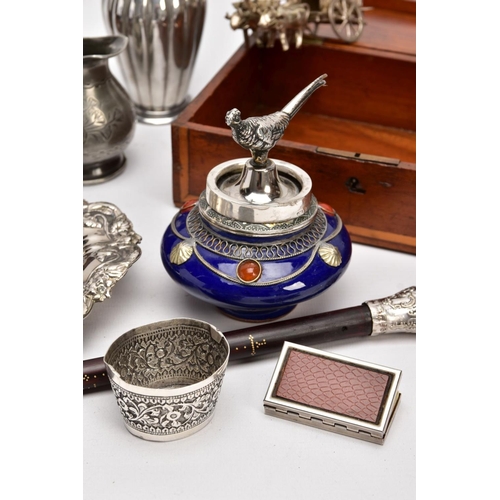 226 - A BOX OF SILVER PLATE, COLLECTABLES AND OTHER METALWARES, including a small Indian white metal embos... 