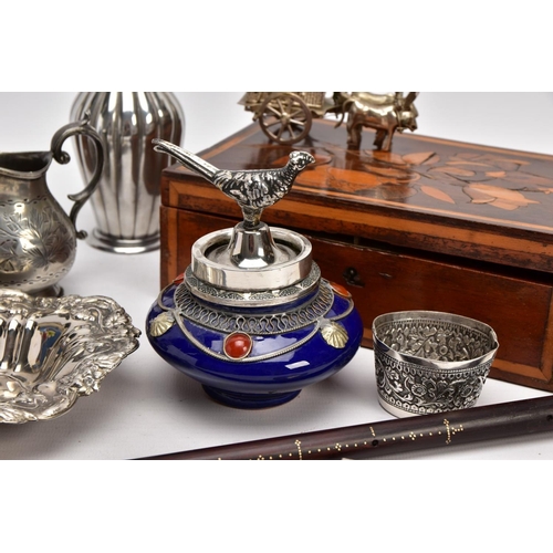 226 - A BOX OF SILVER PLATE, COLLECTABLES AND OTHER METALWARES, including a small Indian white metal embos... 