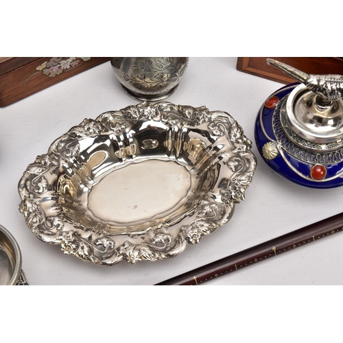 226 - A BOX OF SILVER PLATE, COLLECTABLES AND OTHER METALWARES, including a small Indian white metal embos... 