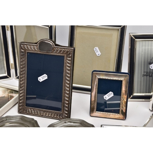 228 - A BOX OF SILVER, SILVER PLATE AND WHITE METAL PHOTOFRAMES, to include a small silver, rectangular fr... 