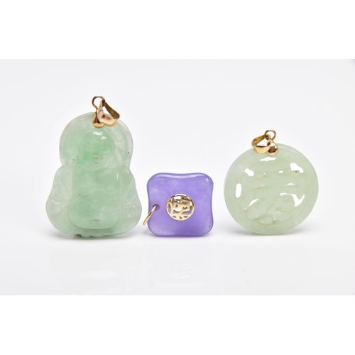 26 - THREE JADE PENDANTS, the first a carved Buddha, fitted with a tapered bail, stamped '14k', the secon... 