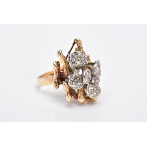 30 - A YELLOW METAL DIAMOND SET RING, of a floral and bark textured design in the style of Andrew Grima, ... 