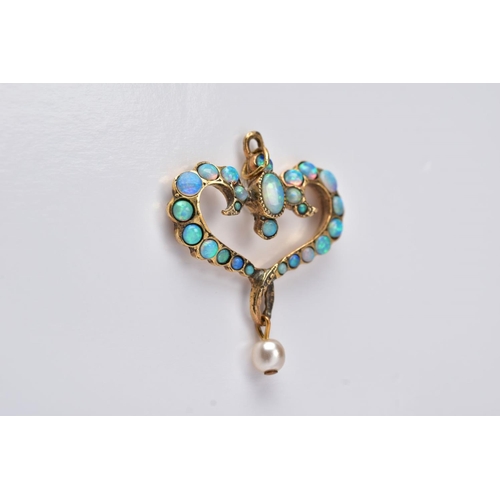 31 - AN OPAL PENDANT, of an openwork heart form, set with oval and circular cut cabochon opals, suspendin... 