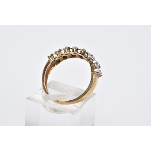 34 - A 9CT GOLD DIAMOND RING, designed with two rows of illusion set, round brilliant cut diamonds, stamp... 