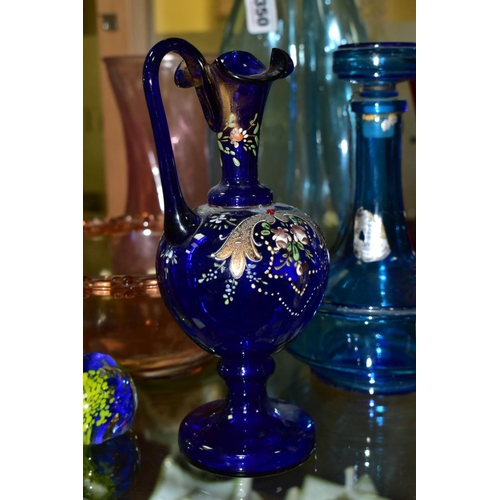 350 - TEN PIECES OF COLOURED GLASSWARE including a blue glass vase of triform shape, with bubble inclusion... 