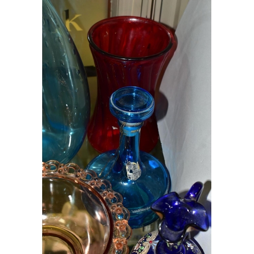 350 - TEN PIECES OF COLOURED GLASSWARE including a blue glass vase of triform shape, with bubble inclusion... 