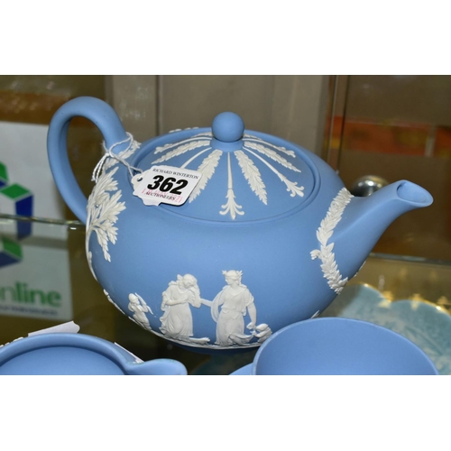 362 - A SMALL COLLECTION OF WEDGWOOD PALE BLUE JASPERWARE, comprising a tea pot and cover and flattened ci... 