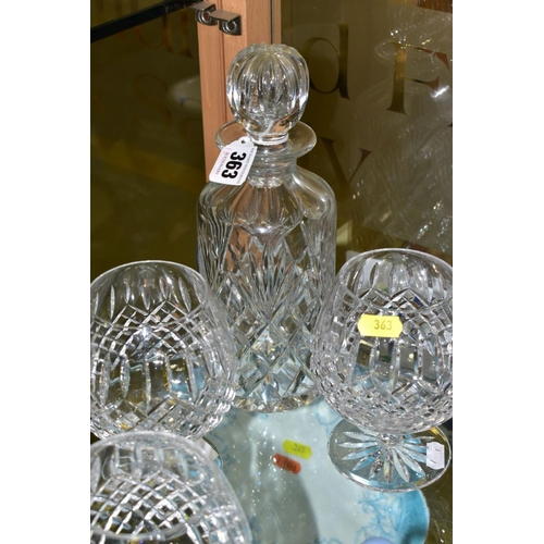 363 - A CUT GLASS DECANTER, of circular form, height 25cm, together with a set of four cut glass brandy ba... 