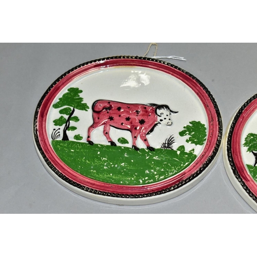 364 - A PAIR OF EARLY 19TH CENTURY STAFFORDSHIRE POTTERY PLAQUES OF OVAL FORM, moulded in relief with a co... 