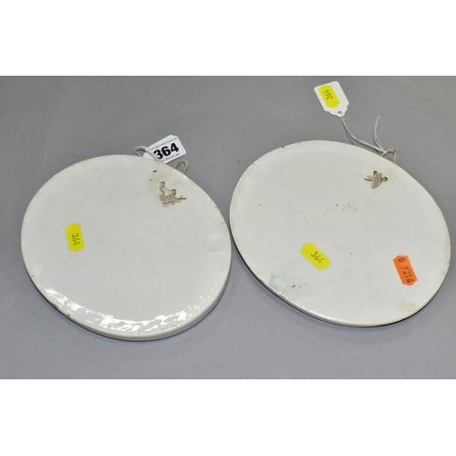 364 - A PAIR OF EARLY 19TH CENTURY STAFFORDSHIRE POTTERY PLAQUES OF OVAL FORM, moulded in relief with a co... 