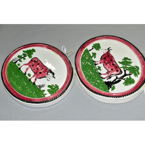 364 - A PAIR OF EARLY 19TH CENTURY STAFFORDSHIRE POTTERY PLAQUES OF OVAL FORM, moulded in relief with a co... 