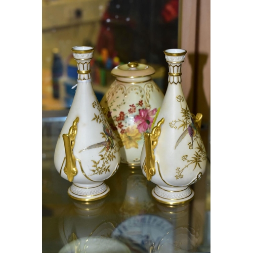 373 - A SMALL COLLECTION OF ROYAL WORCESTER PORCELAIN, comprising a pair of blush ivory conical twin handl... 