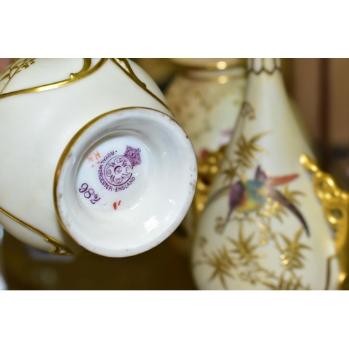 373 - A SMALL COLLECTION OF ROYAL WORCESTER PORCELAIN, comprising a pair of blush ivory conical twin handl... 