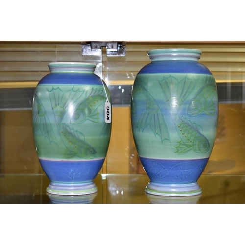 384 - A POOLE STUDIO SALLY TUFFIN BALUSTER VASE AND MATCHING JAR, the baluster vase handpainted with bands... 