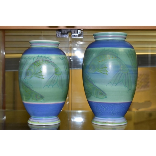 384 - A POOLE STUDIO SALLY TUFFIN BALUSTER VASE AND MATCHING JAR, the baluster vase handpainted with bands... 