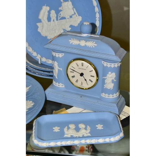 387 - A COLLECTION OF WEDGWOOD PALE BLUE JASPERWARE, to include a set of ten Christmas plates 1976-1985, '... 