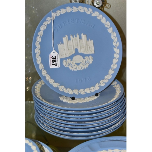 387 - A COLLECTION OF WEDGWOOD PALE BLUE JASPERWARE, to include a set of ten Christmas plates 1976-1985, '... 