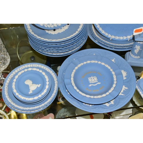 387 - A COLLECTION OF WEDGWOOD PALE BLUE JASPERWARE, to include a set of ten Christmas plates 1976-1985, '... 