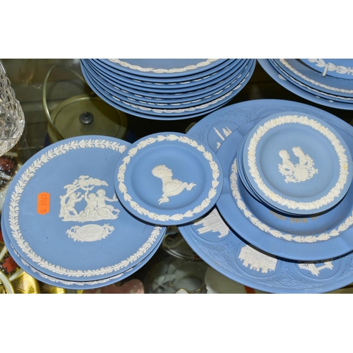 387 - A COLLECTION OF WEDGWOOD PALE BLUE JASPERWARE, to include a set of ten Christmas plates 1976-1985, '... 