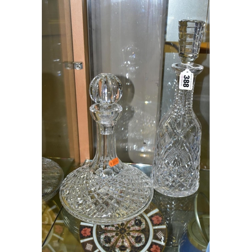 388 - FOUR CUT GLASS DECANTERS, comprising a Waterford ships decanter and stopper and a Waterford mallet s... 