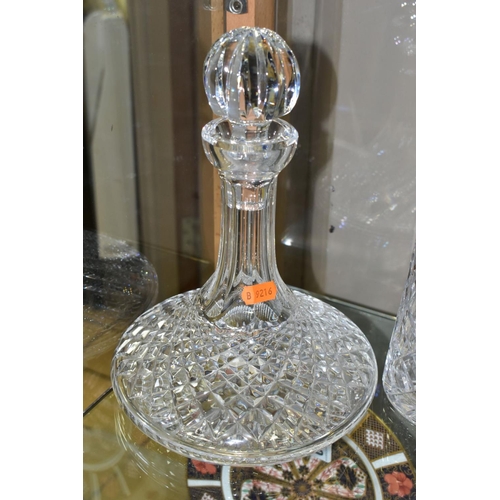 388 - FOUR CUT GLASS DECANTERS, comprising a Waterford ships decanter and stopper and a Waterford mallet s... 