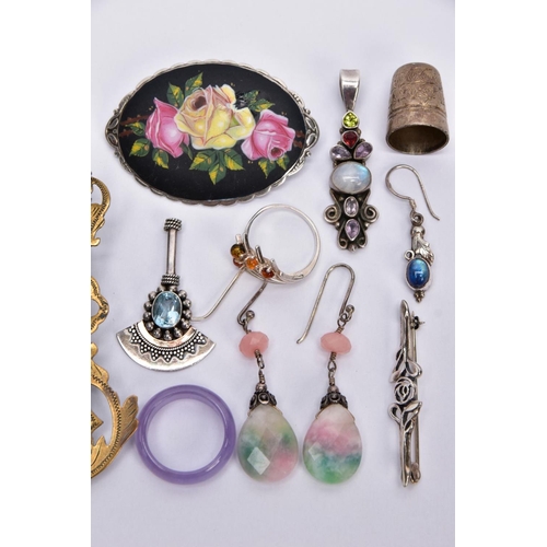 39 - A BAG OF ASSORTED ITEMS, to include a white metal drop pendant set with a central oval moonstone cab... 