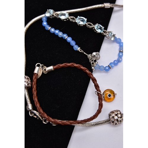 42 - FOUR BRACELETS AND NECKLET, to include a white metal slider bracelet set with five oval cut blue top... 