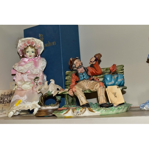 439 - A GROUP OF CERAMIC FIGURES AND ORNAMENTS, including Capo Di Monte tramp on a bench, elderly couple, ... 