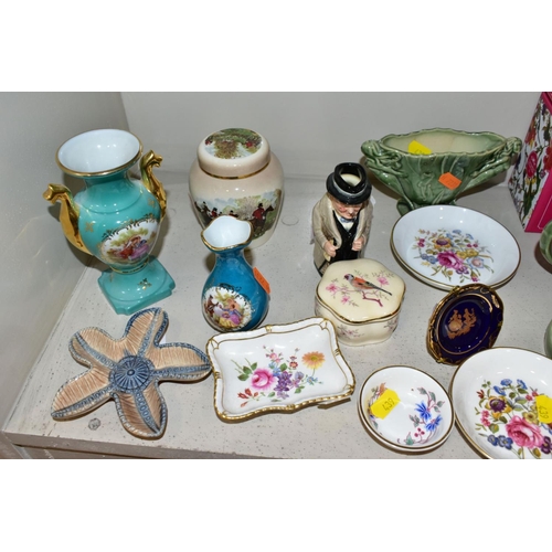 439 - A GROUP OF CERAMIC FIGURES AND ORNAMENTS, including Capo Di Monte tramp on a bench, elderly couple, ... 