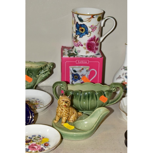 439 - A GROUP OF CERAMIC FIGURES AND ORNAMENTS, including Capo Di Monte tramp on a bench, elderly couple, ... 