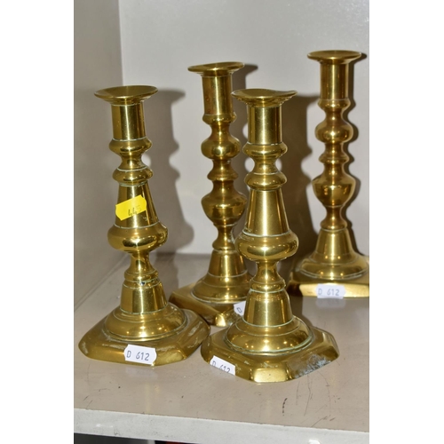 445 - SIX NEAR PAIRS OF BRASS CANDLESTICKS, tallest height 21.5cm (12)