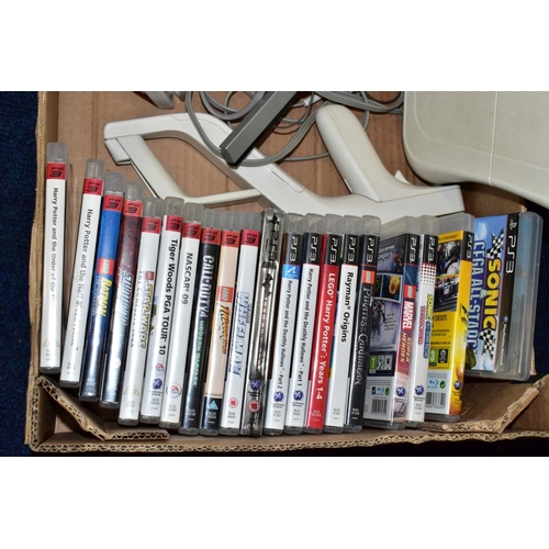 452 - A BOX OF GAMING ITEMS, to include Wii console and Wii fit  board and game, various other games (acti... 